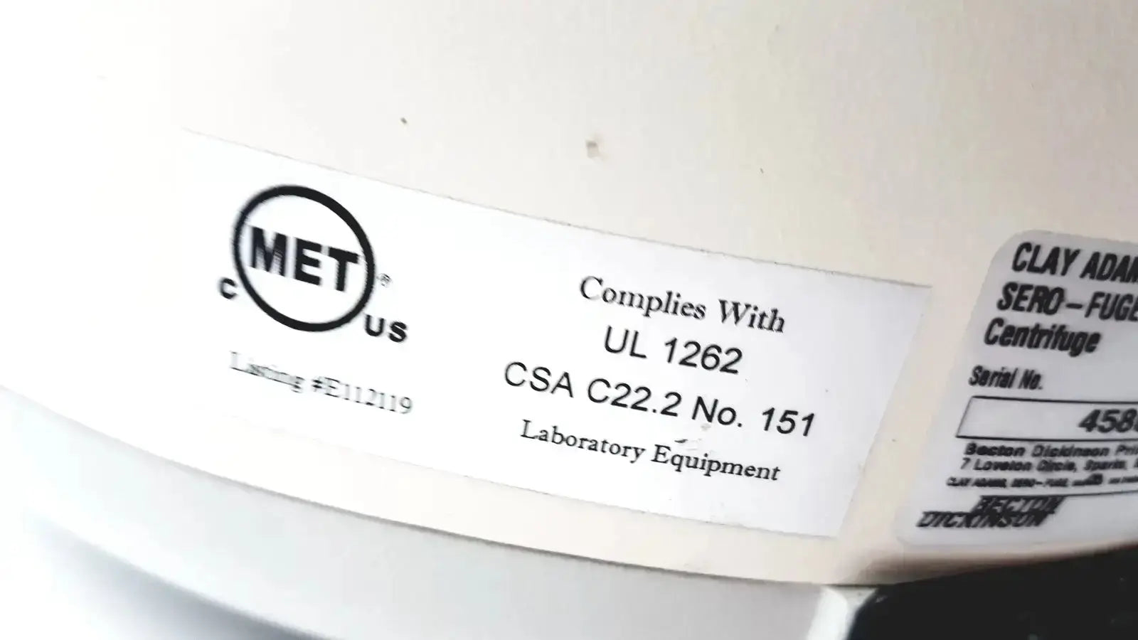 White cylindrical clay adams becton dickinson sero-fuge 2001 laboratory centrifuge with certification stickers and serial number