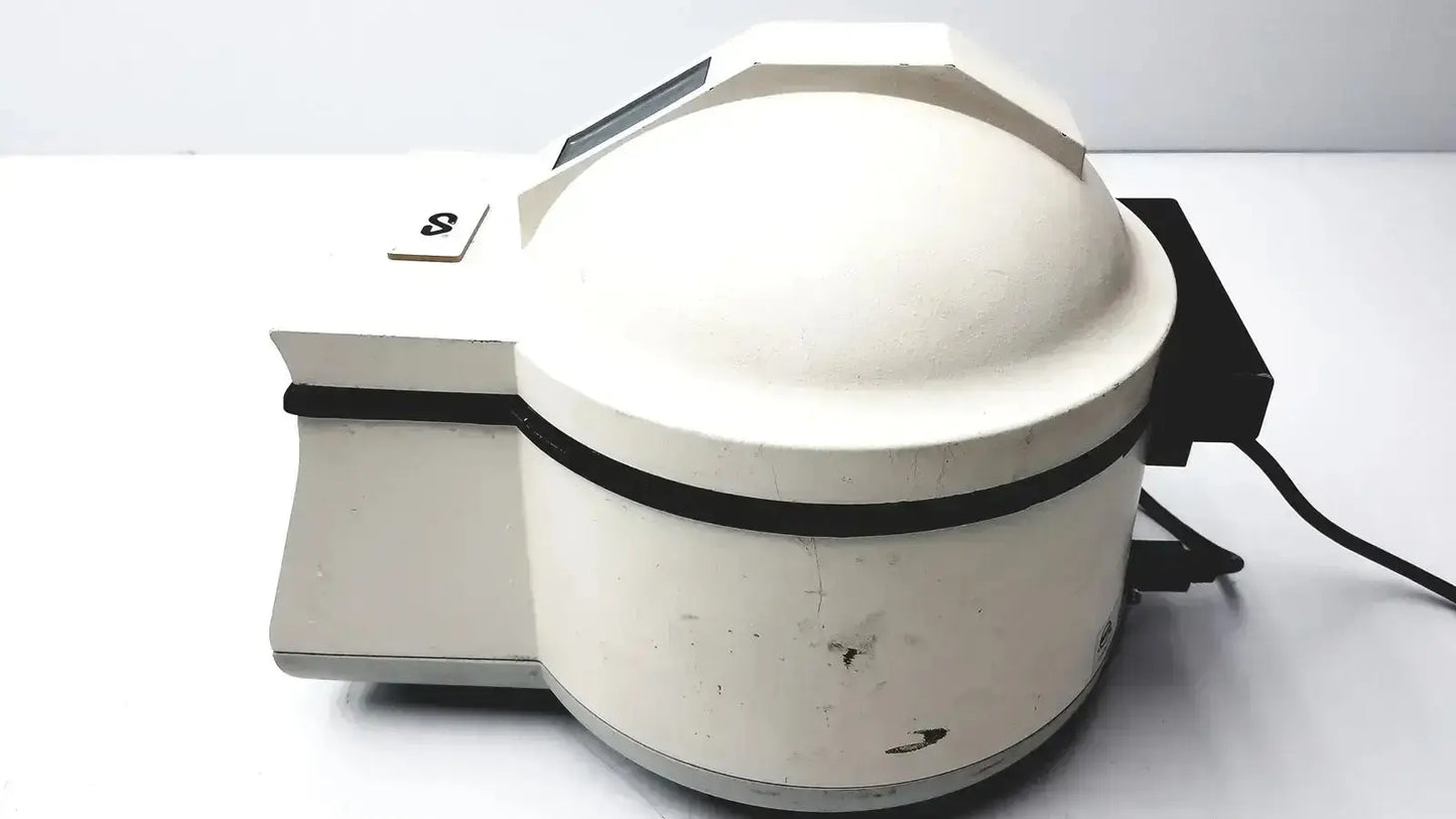 White ceramic clay adams benchtop centrifuge model 420351 with black accents and rounded dome-shaped top