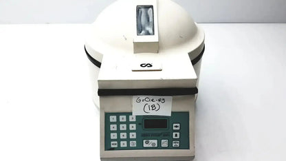 White clay adams benchtop centrifuge model 420351 with green control panel and black trim for laboratory use
