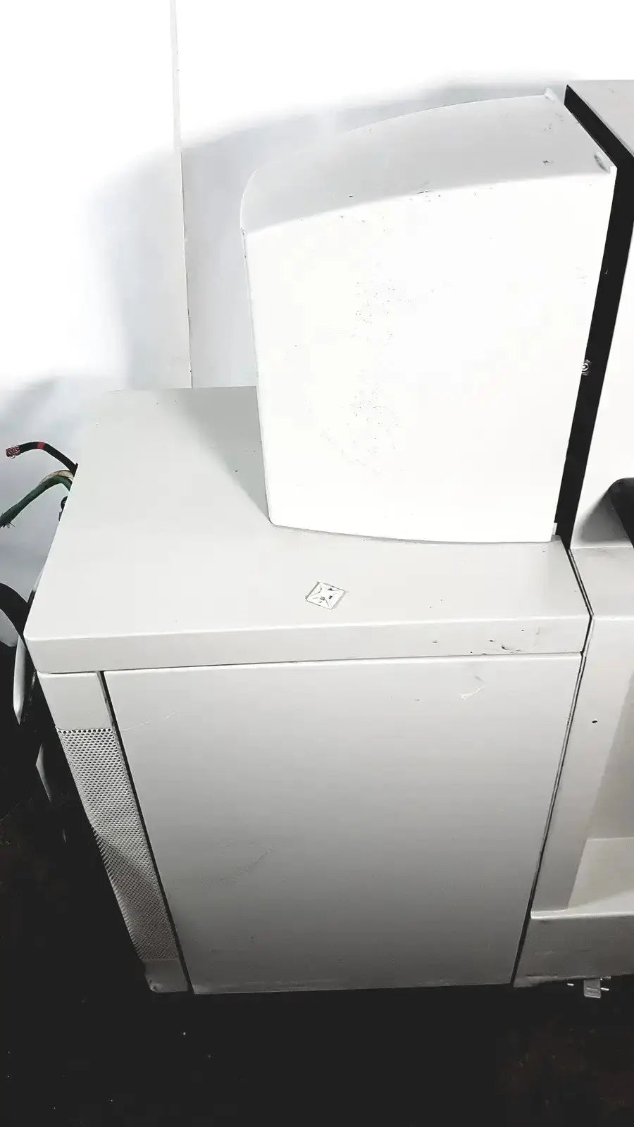 White coherent novus omni office printer with sleek rectangular design and subtle branding on front panel