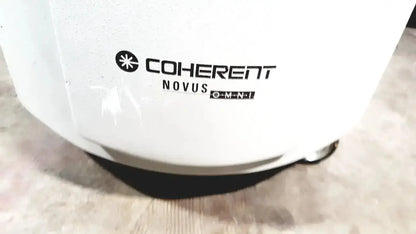 White coherent novus omni blender base with sleek modern design and black rubberized foot for omni opthalmic photocoagulation