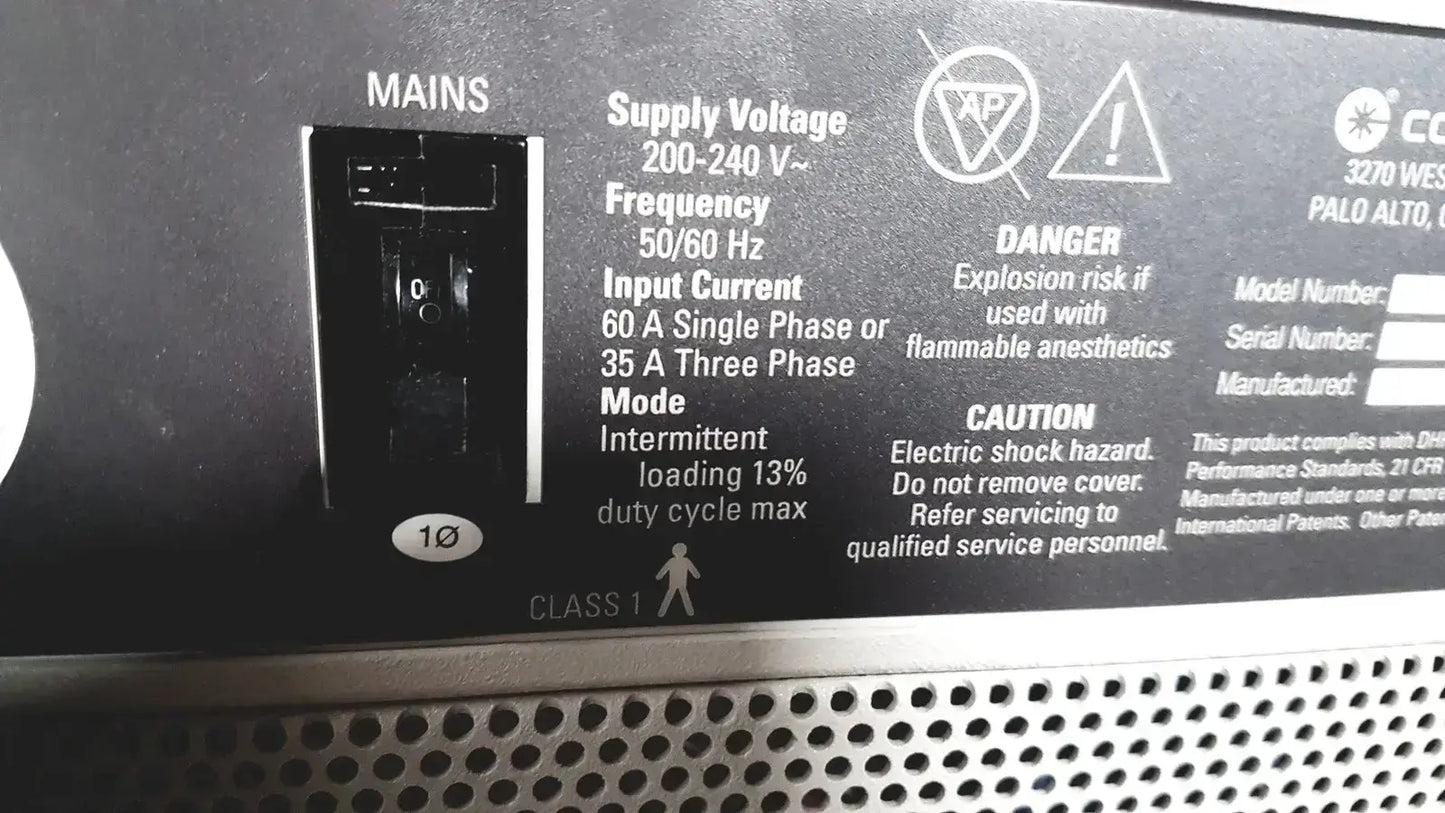 Black mains power switch with white 10 indicator on back panel of coherent novus omni opthalmic photocoagulation laser system