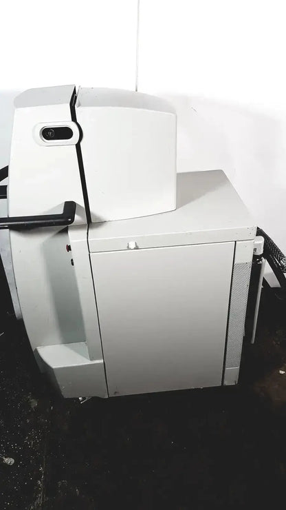 White industrial coherent novus omni printer with black handle and side ventilation grille for omni opthalmic photocoagulation use