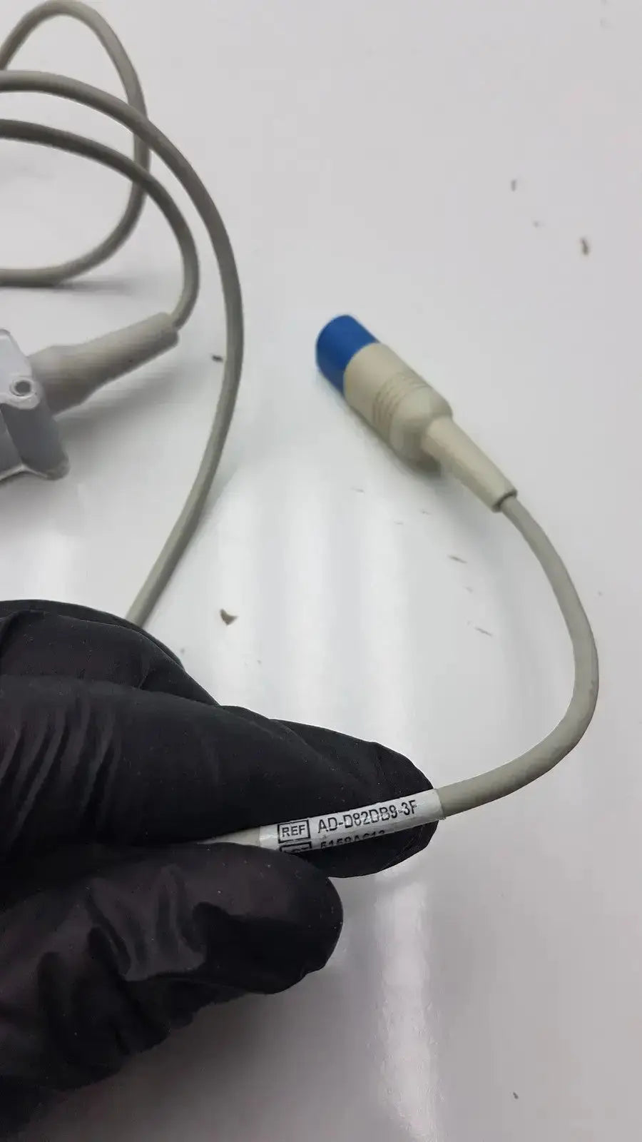 Gray spo2 extension cable with blue and beige connector labeled ref ad-0872d93f for compatible drager spo2 sensor