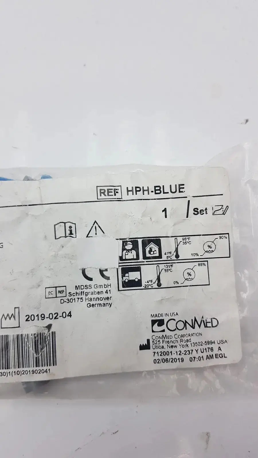 Blue medical device packaging of conmed banana adapter 10/pk ref hph-blue with manufacturer details visible