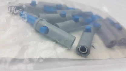 Gray cylindrical conmed banana adapter connectors with blue caps packaged in a clear plastic bag 10 per pack