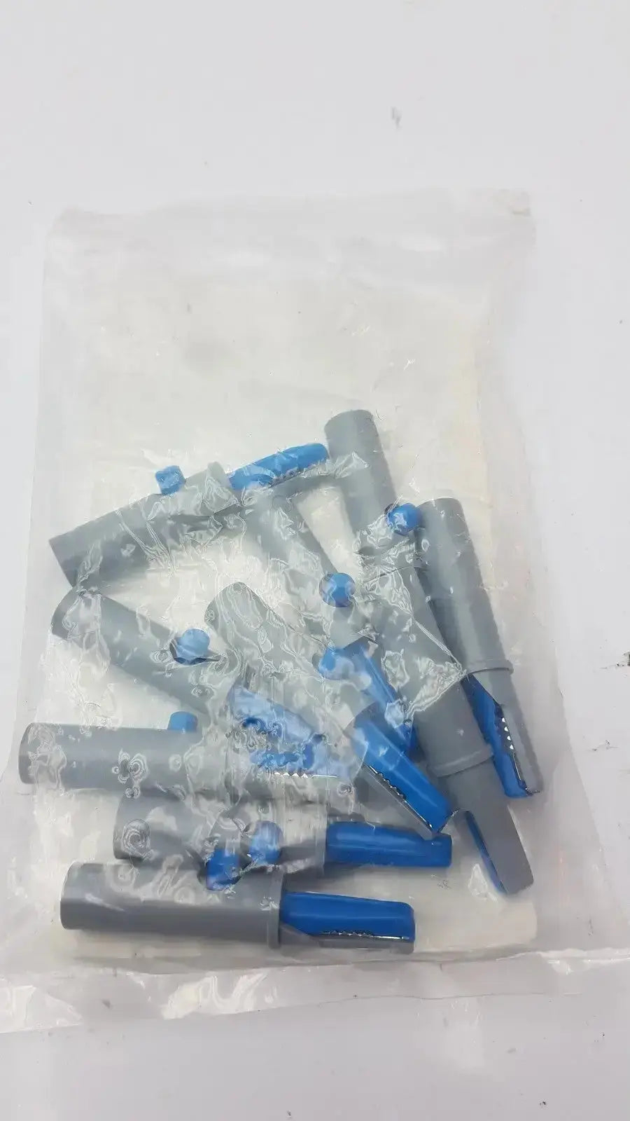 Conmed banana adapter 10/pk gray and blue plastic wall anchors in clear plastic bag for secure installation