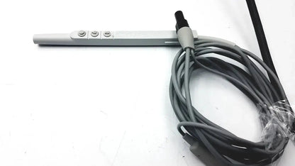 Gray cylindrical conmed hyfrecator 2000 model 7-900-115 dessicator with three circular buttons and coiled cable for sale