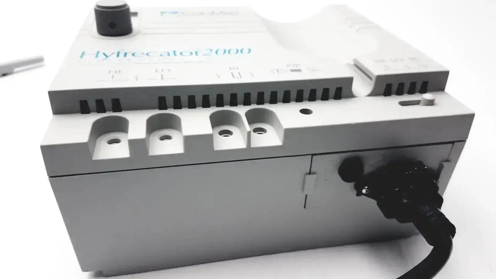 Gray plastic conmed hyfrecator 2000 model 7-900-115 with black power cord ventilation slots back view used medical equipment for sale
