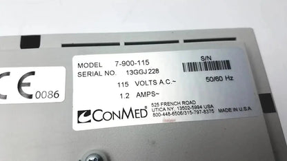 Gray metal conmed hyfrecator 2000 model 7-900-115 with white label showing serial and electrical specs back view used medical equipment for sale