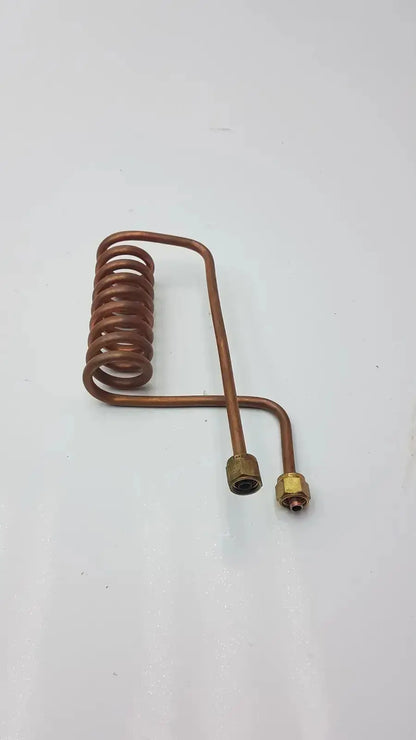 Copper nickel fin tube coil heat exchanger featuring a copper-colored coiled tube with brass fittings