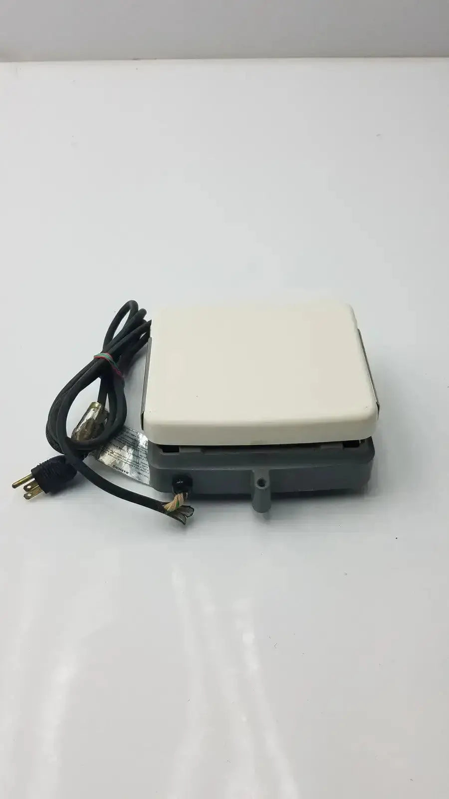 White and gray plastic outdoor motion-activated light controller with black cord for Corning laboratory stirrer model RC-310