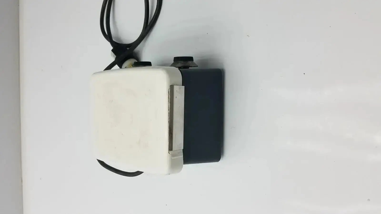 White and black Corning PC-351 laboratory hot plate stirrer with coiled cable for magnetic stirring and heating applications