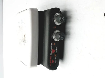 Black corning pc420 magnetic hot plate stirrer with two rotary knobs and white rectangular base for laboratory use