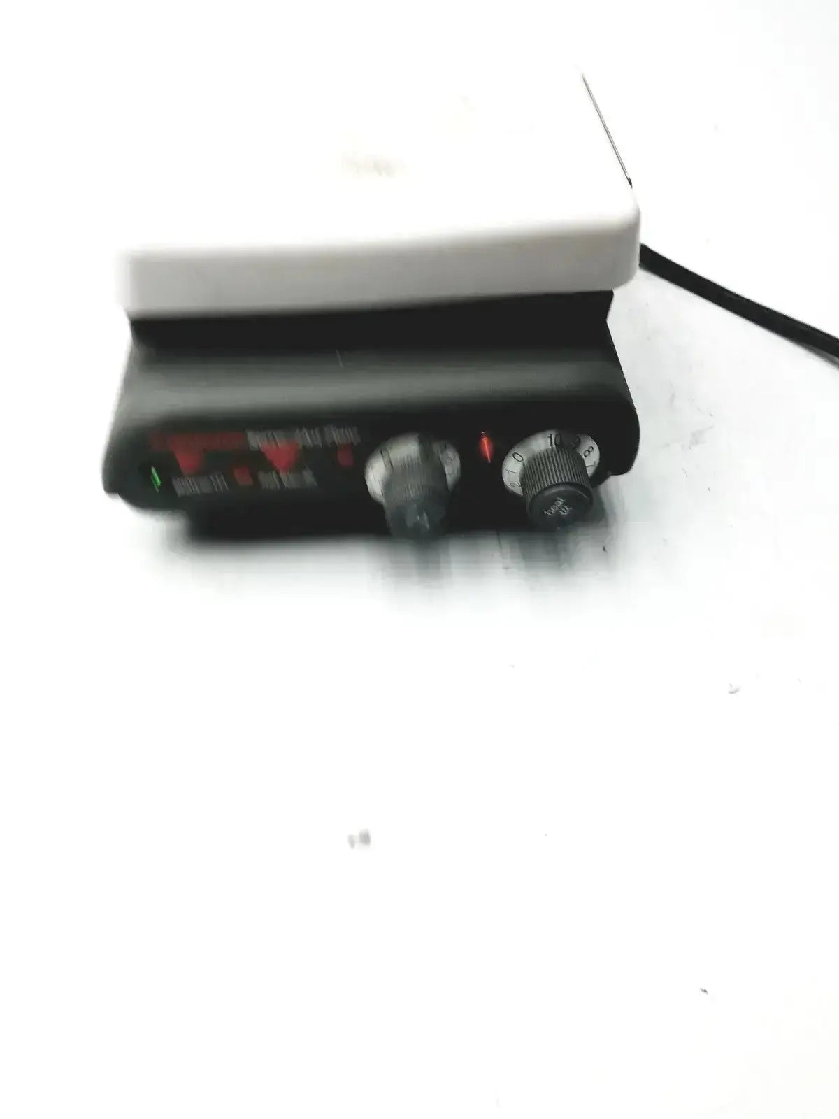 Black and white corning pc420 magnetic hot plate with two control knobs for laboratory hot plate stirrer use