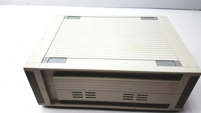Beige plastic vintage computer tower with horizontal ribbed texture and gray panels for cosmed quark b2 pulmonary use
