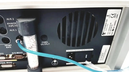Black plastic cosmed quark b2 pulmonary audio interface with cylindrical filter tube and blue cable connected to inputs