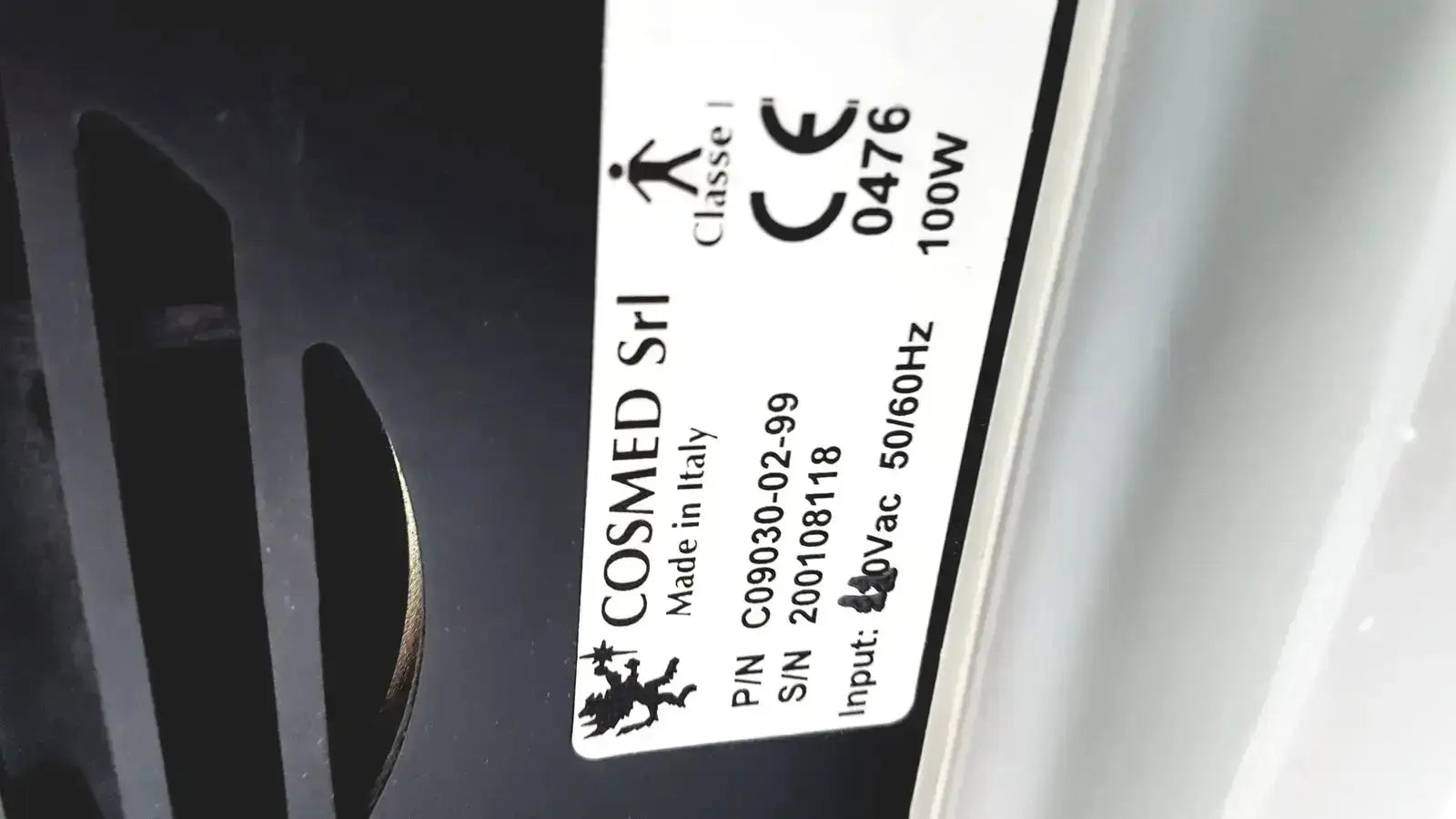 White label with electrical specifications in black text on the back of cosmed quark b2 pulmonary gas exchange device