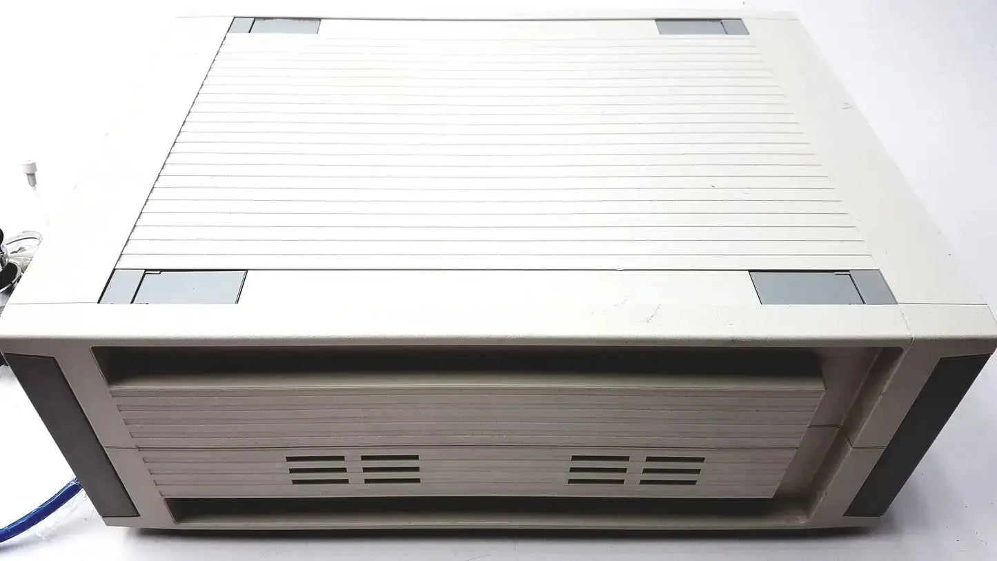 Beige plastic computer tower with ribbed texture and gray accents for cosmed quark b2 pulmonary gas exchange device
