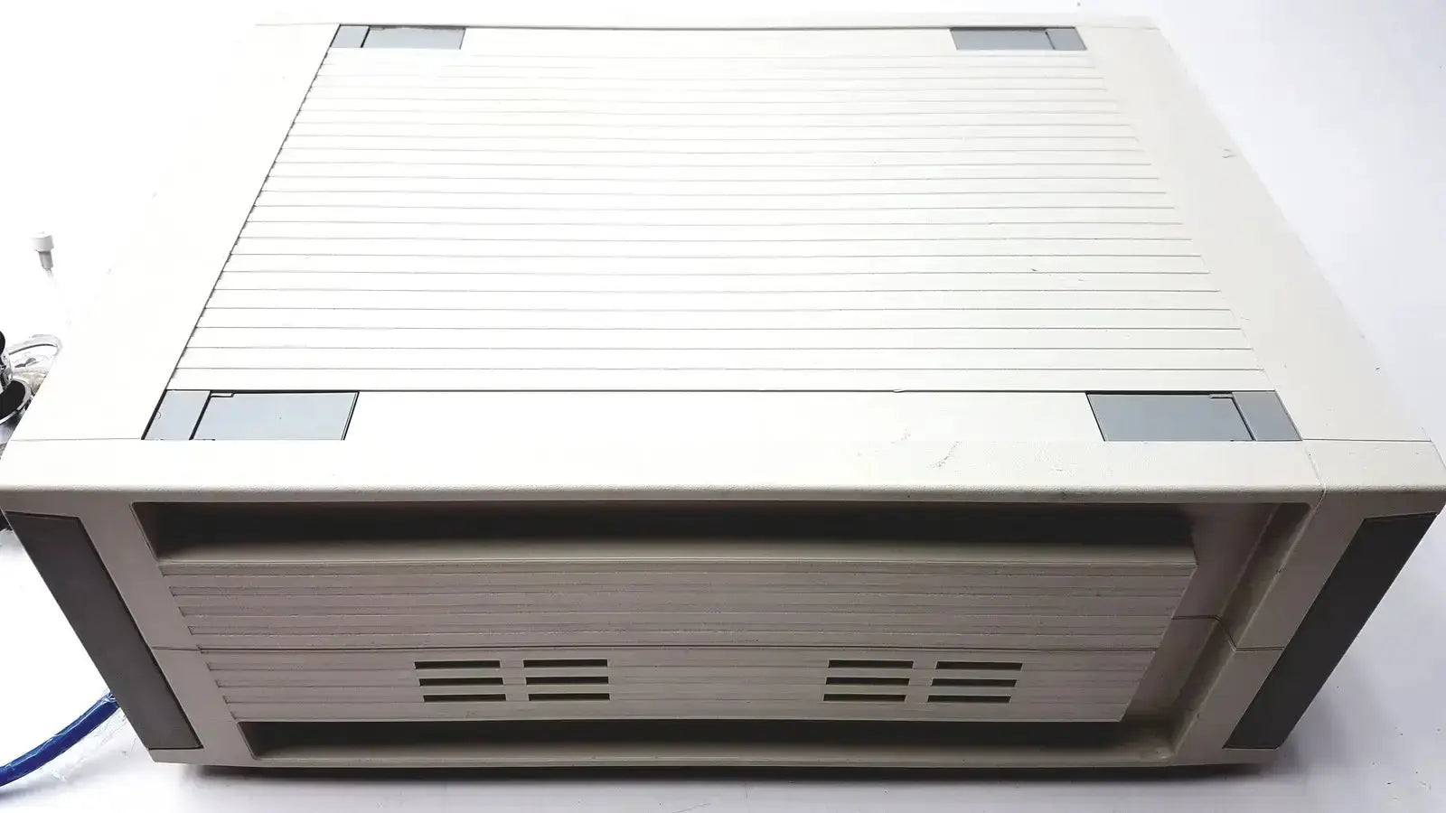 Beige plastic computer tower with ribbed texture and gray accents for cosmed quark b2 pulmonary gas exchange device