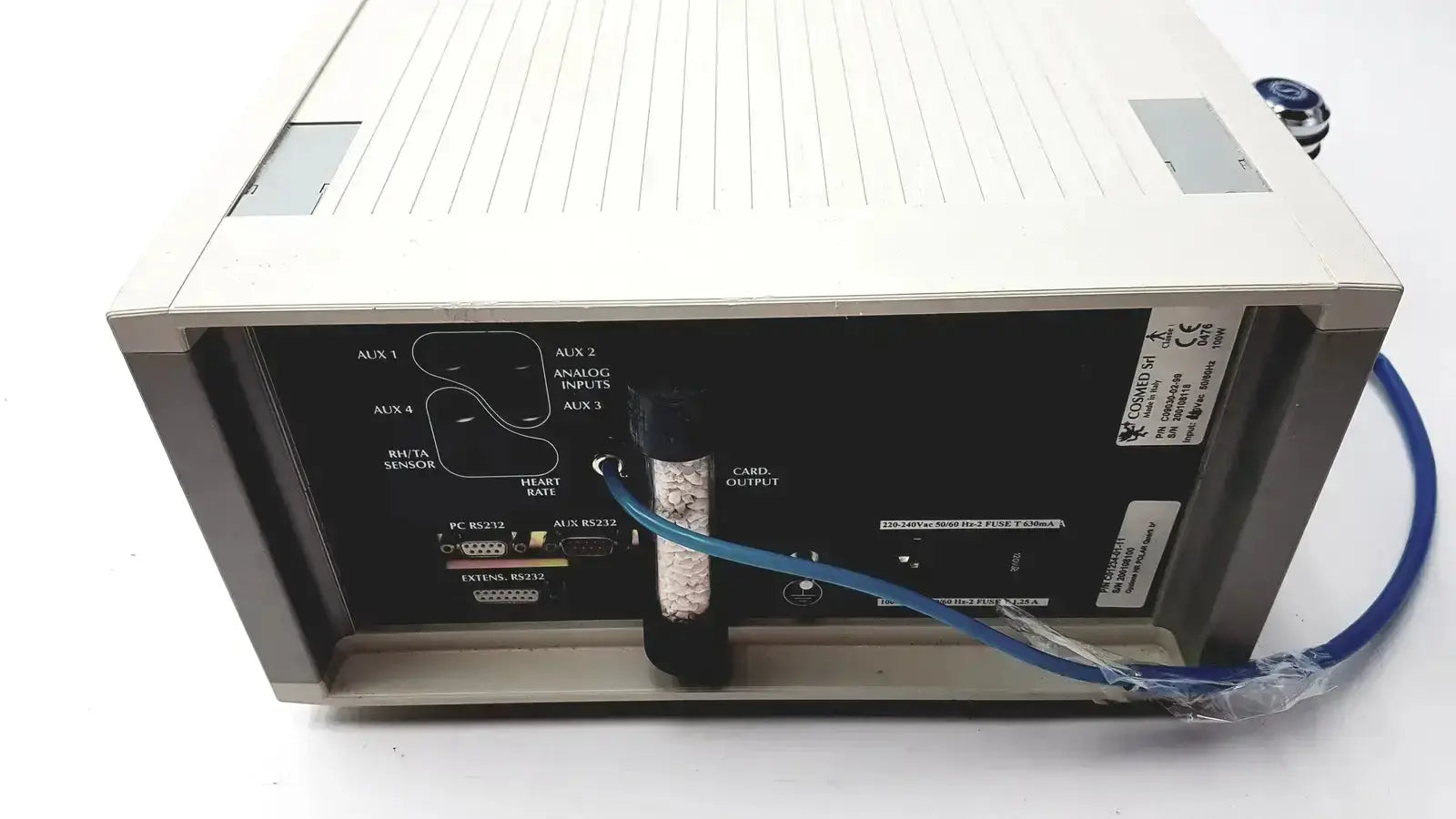 White rectangular cosmed quark b2 pulmonary device with black port panel and blue cable connected to bead tube