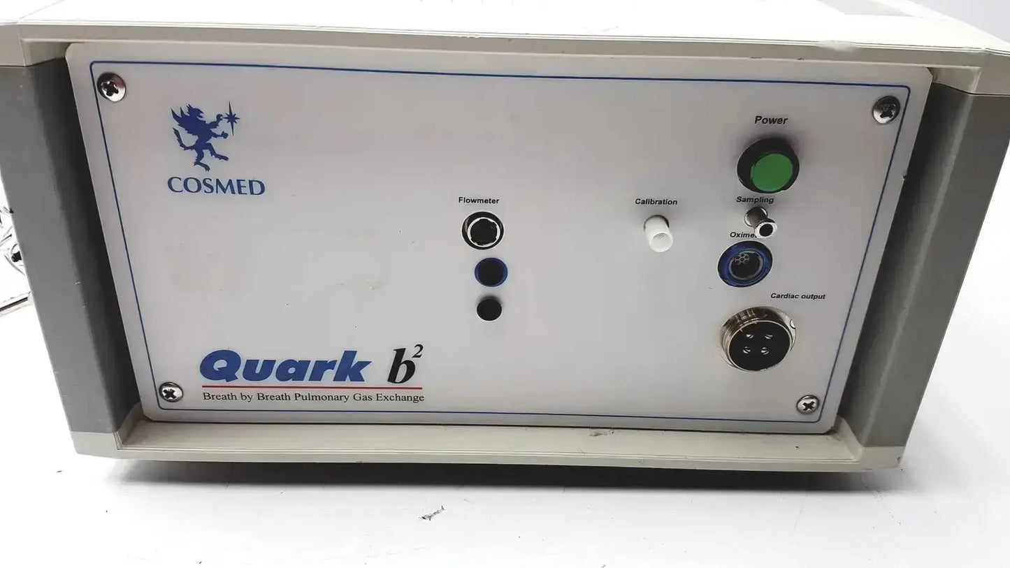 White COSMED Quark b2 pulmonary gas exchange analyzer with green power button and labeled ports for pulmonary gas exchange