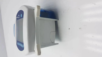 White and blue Covidien Kangaroo Pump enteral feeding pump device with digital screen buttons and open compartment housing blue component