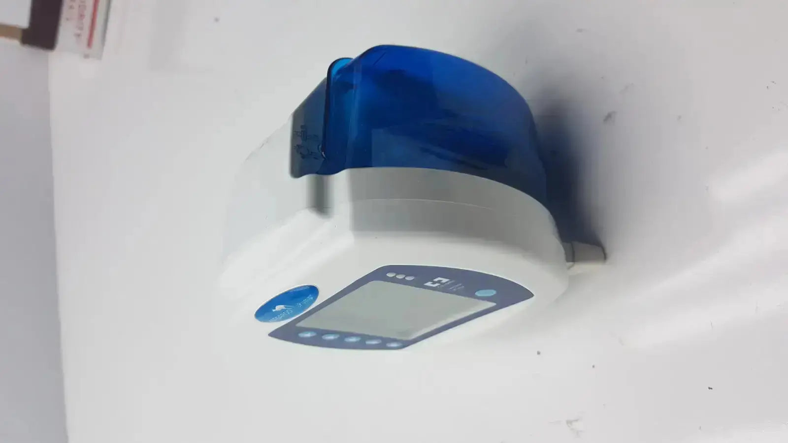 White and blue digital blood pressure monitor with curved plastic casing for covidien kangaroo enteral feeding pump device