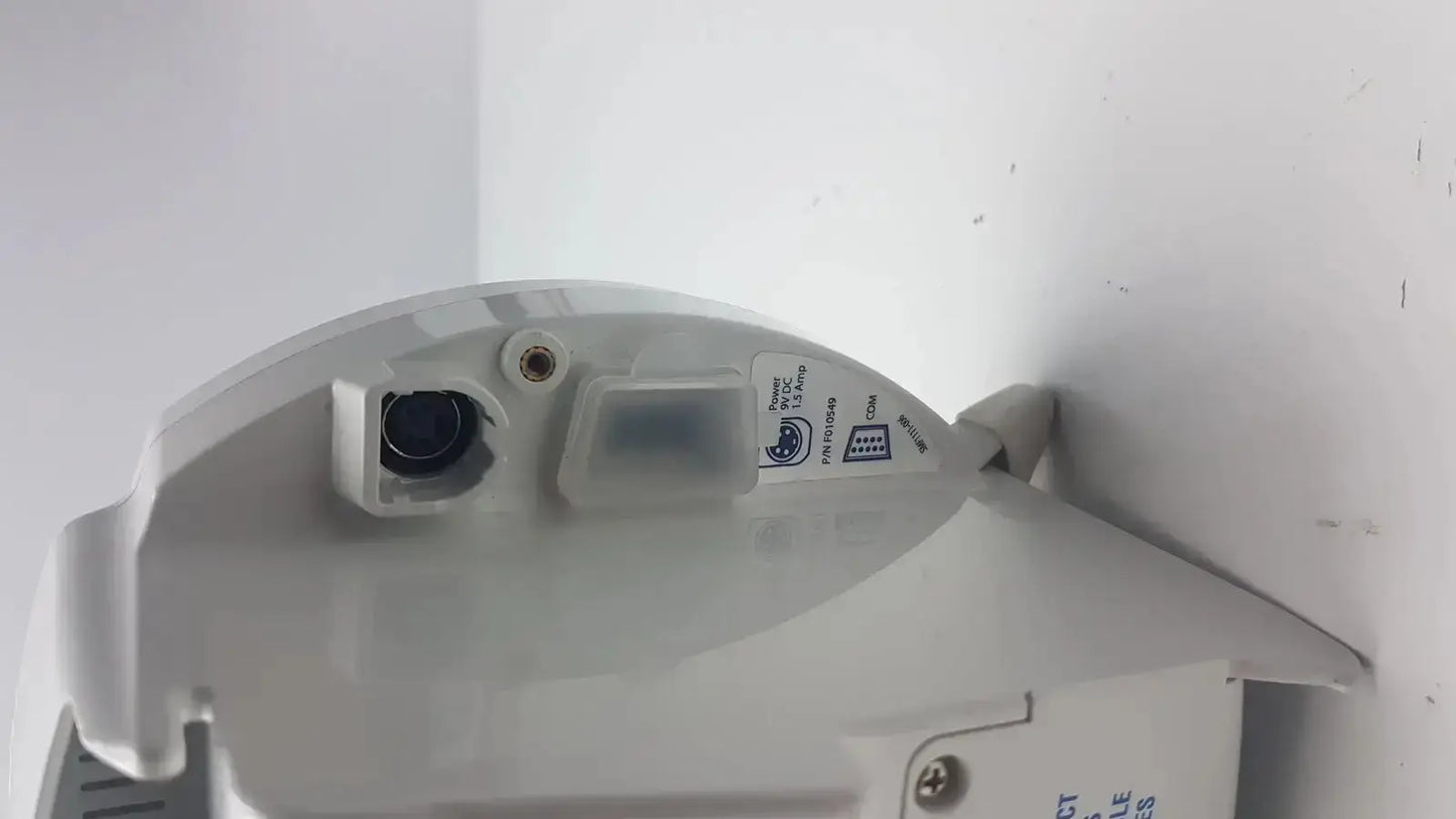 White plastic Covidien Kangaroo enteral feeding pump device with black lens security camera and attached sensor module