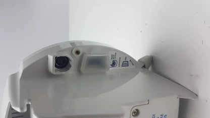White plastic Covidien Kangaroo enteral feeding pump device with black lens security camera and attached sensor module