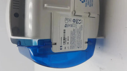 Blue and gray covidien kangaroo pump enteral feeding pump device with white label showing regulatory markings and barcode