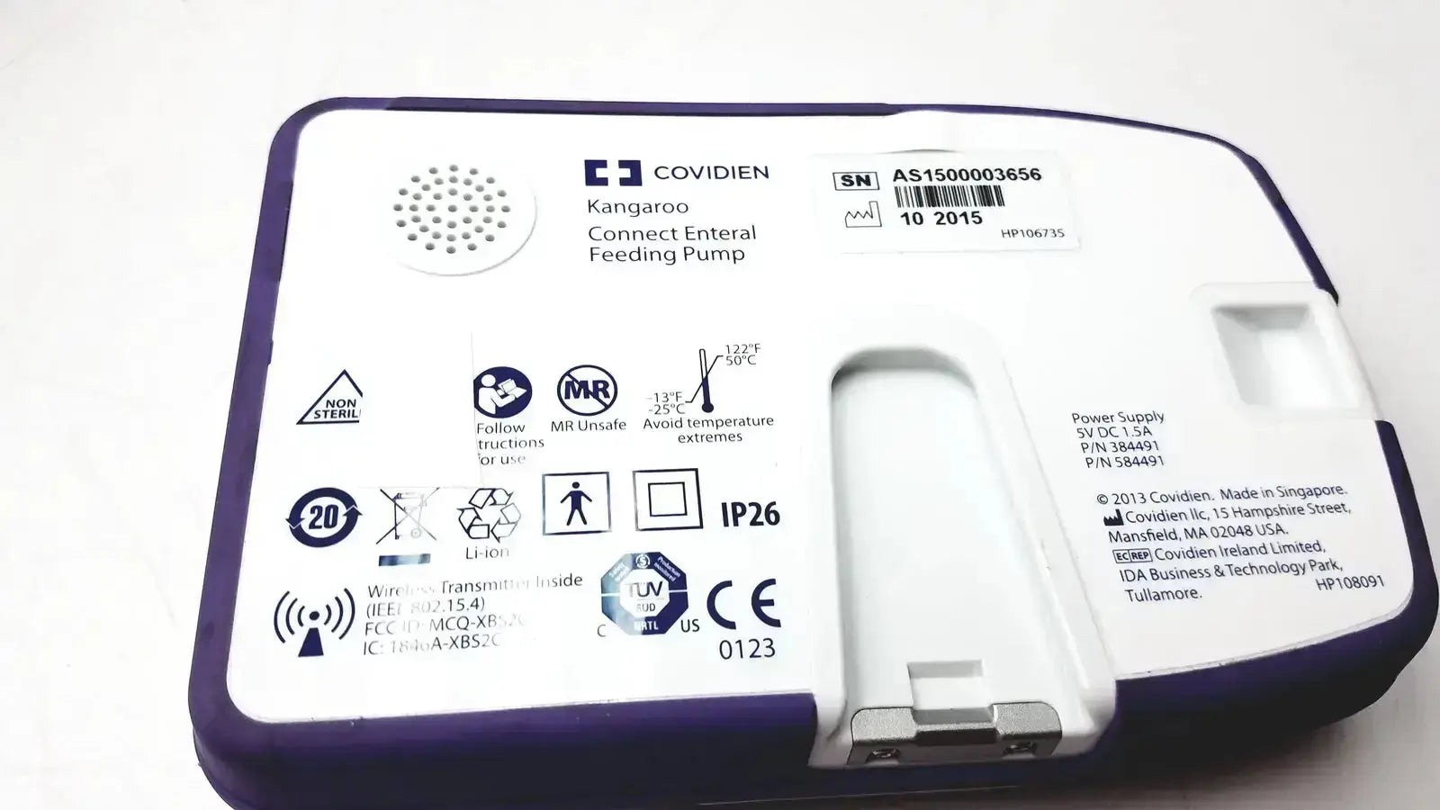 Purple and white covidien kangroo feeding pump with connect pole clamp and extras for enteral feeding use