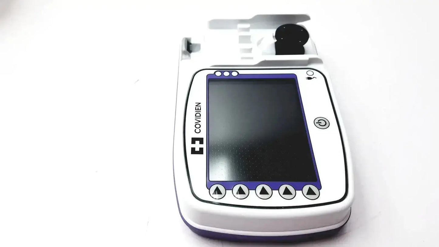 White and purple covidien kangroo feeding pump with rectangular screen, four buttons, black cap, and pole clamp accessories