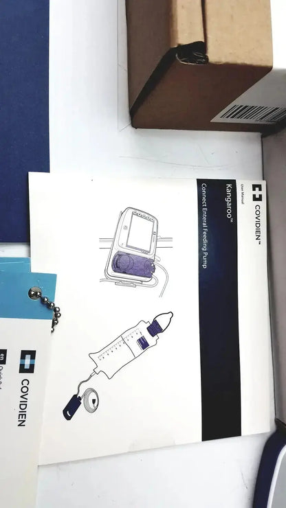 Covidien kangroo feeding pump instruction manual with illustrations for connect pole clamp and extras use case