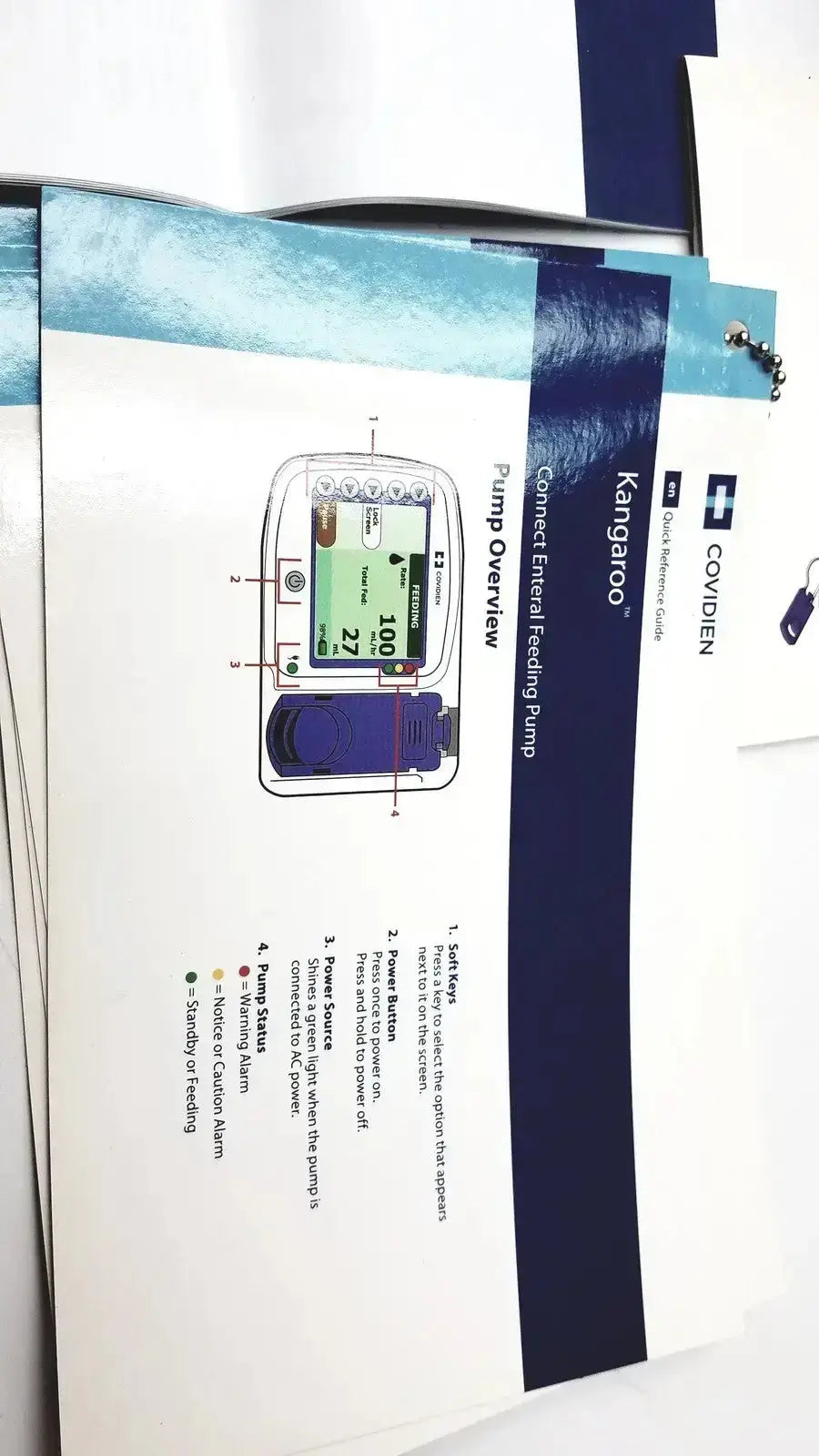 Blue covidien kangroo feeding pump with digital display control buttons pole clamp and extras for medical use
