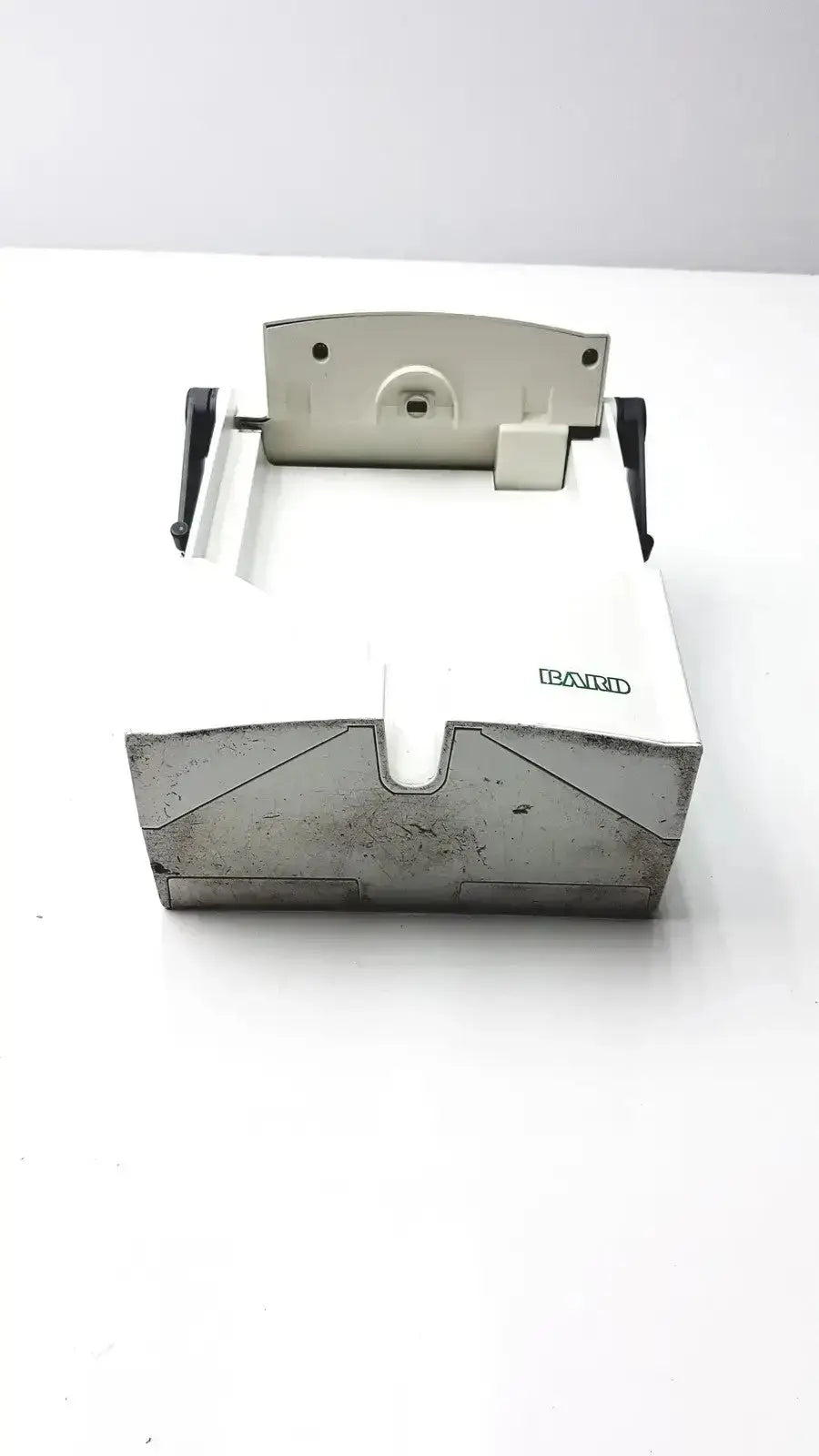 White and gray bakid cash register with metallic top plate and black levers for criticore fluid output temperature monitor model 000002n