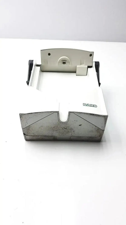 White and gray bakid cash register with metallic top plate and black levers for criticore fluid output temperature monitor model 000002n