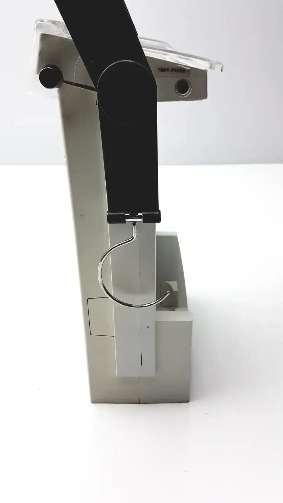 Silver metallic desk lamp with black adjustable arm and clear acrylic base in criticore fluid output temperature monitor model 000002n