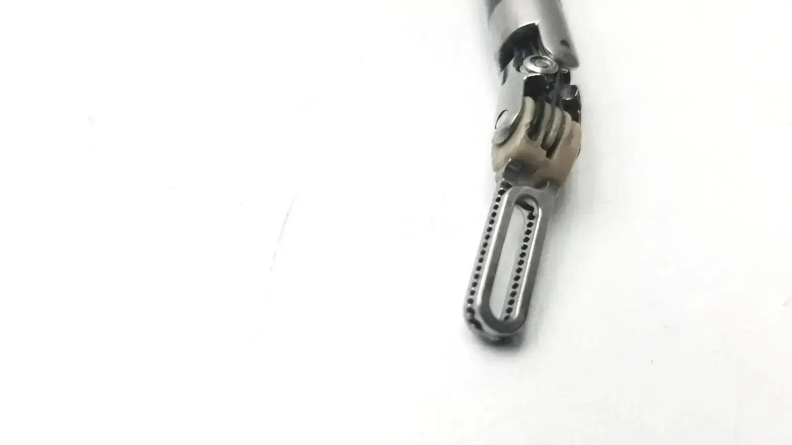 Silver-colored metal da vinci xi 471205 fenestrated bipolar forceps 8mm with textured joint and fenestrated handle
