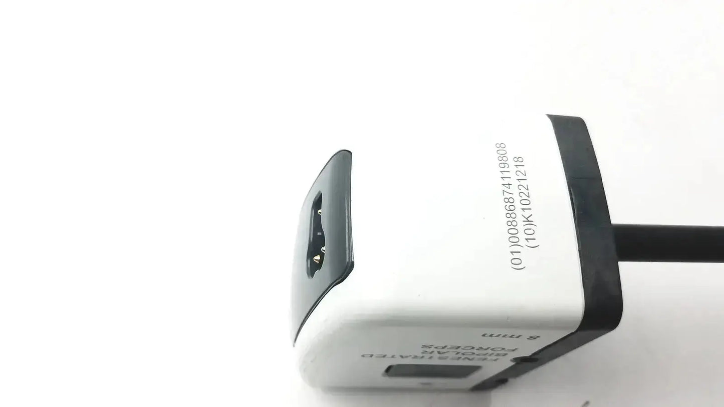 White and black dual usb wall charger with compact rectangular design shown alongside fenestrated bipolar forceps 8mm product