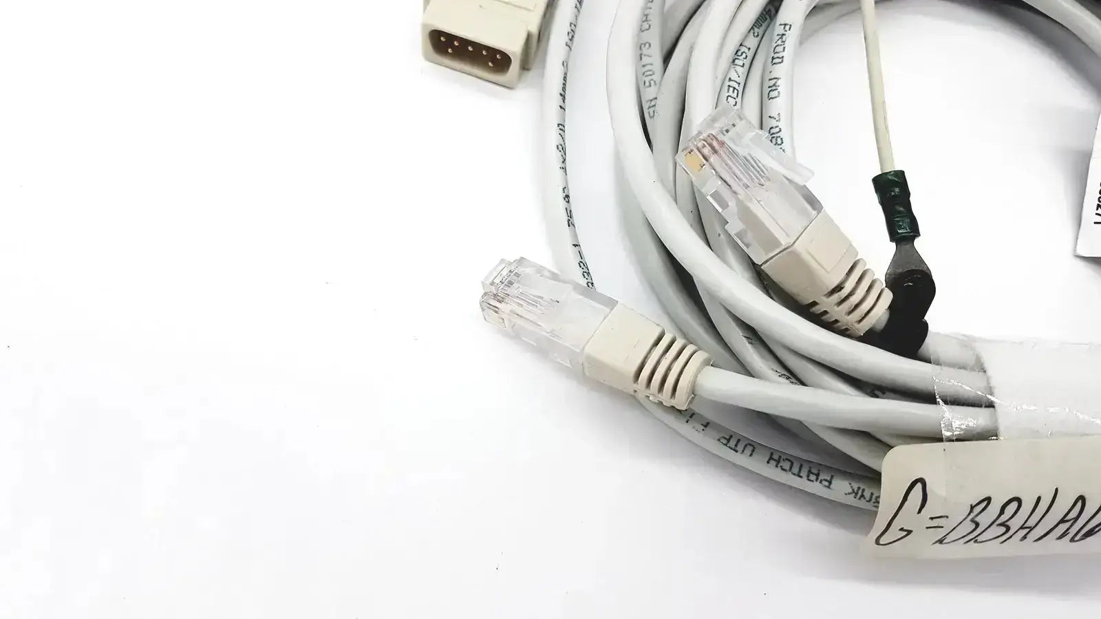 Coiled gray ethernet cable with beige rj45 connectors and black clip for mon aic network 20ft extension by Datex