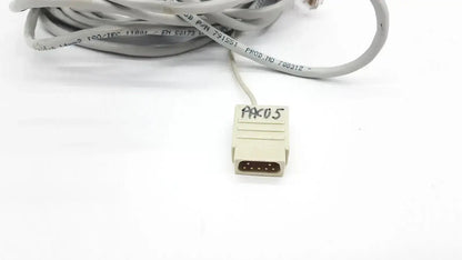 Gray coiled mon aic network cable with beige 9-pin d-sub connector marked pak05 for aic network cable extension