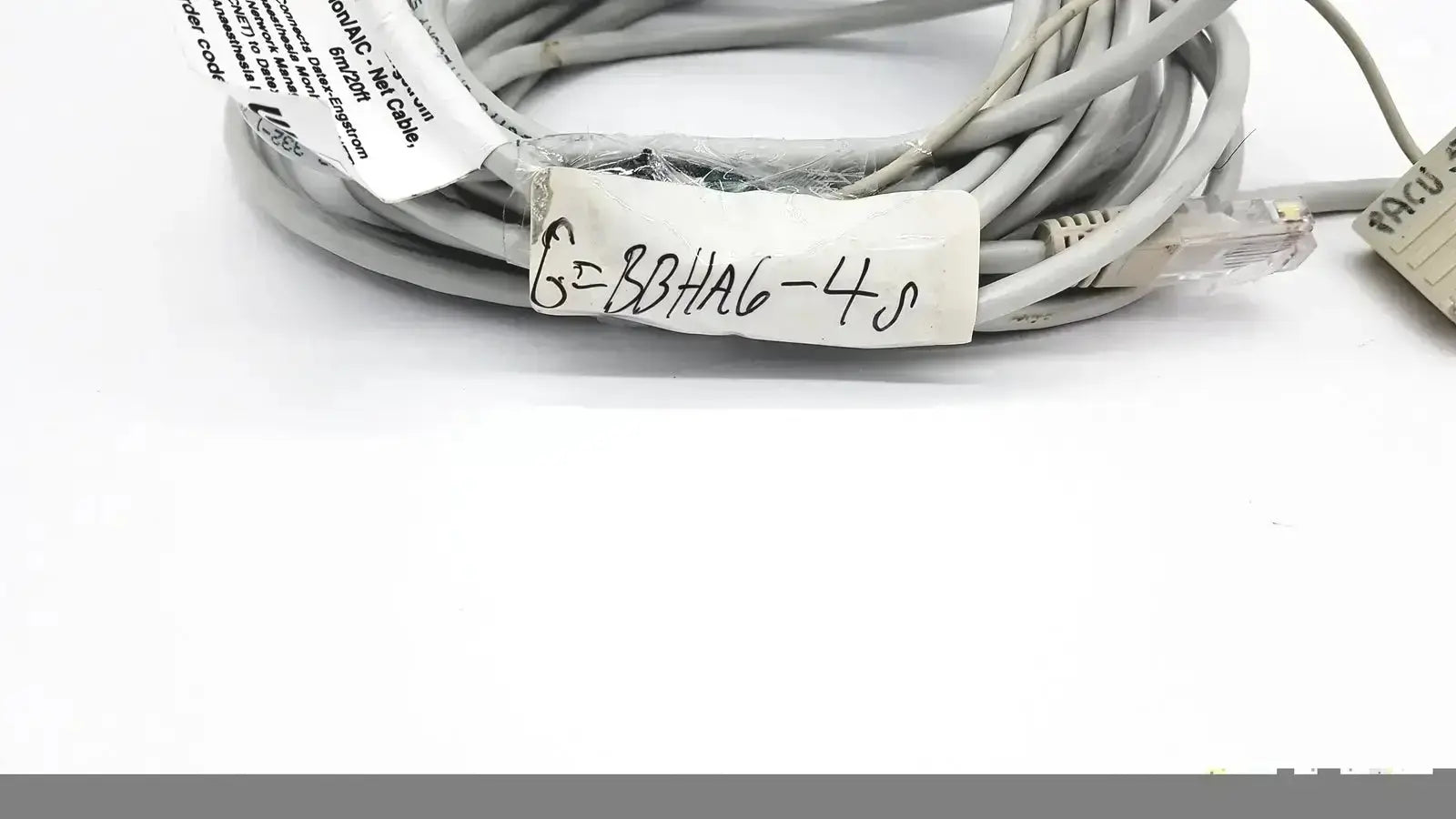 Gray Datex extension mon aic network cable with rj45 connectors and handwritten label 6m 20ft length network cable