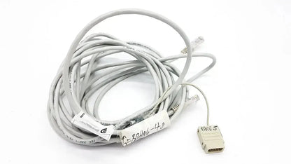 Gray coiled Datex-Extension mon aic network cable 6m with beige rj45 connector and printed labels for network use