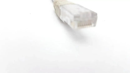 Clear plastic ethernet cable connector with beige rubber band on datex-extension mon aic network cable 6m length