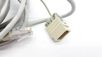 Beige 8-pin d-sub network cable with clear rj45 plug and handwritten acu 3 label for mon aic network use 6m length