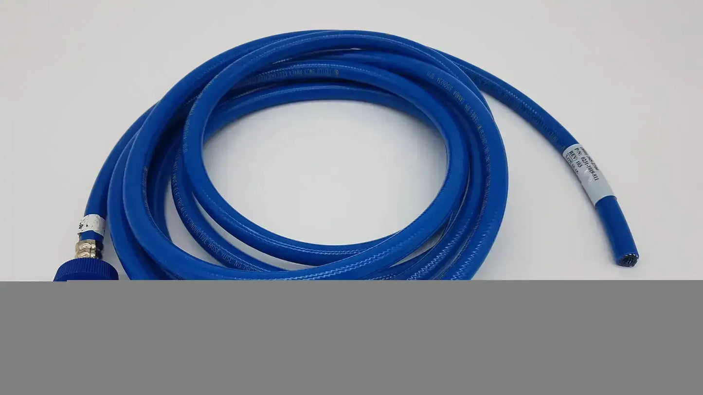 Blue coiled hose assembly with metallic connectors and white label datex ohmeda hospital surplus product