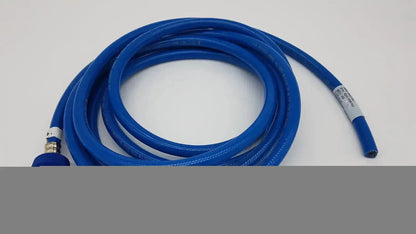 Blue coiled hose assembly with metallic connectors and white label datex ohmeda hospital surplus product