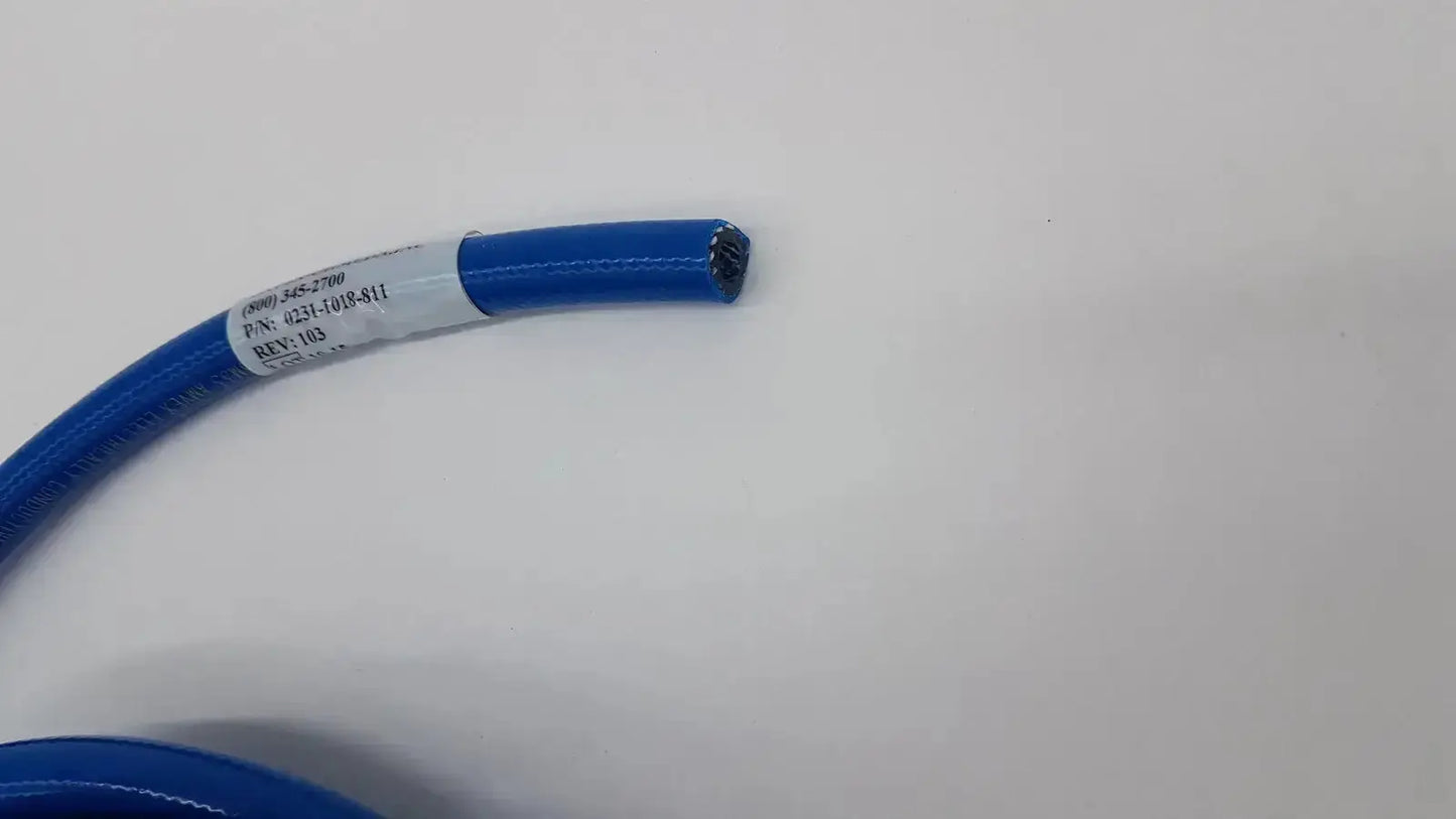 Blue coiled hose assembly with white label datex ohmeda hospital surplus medical equipment part