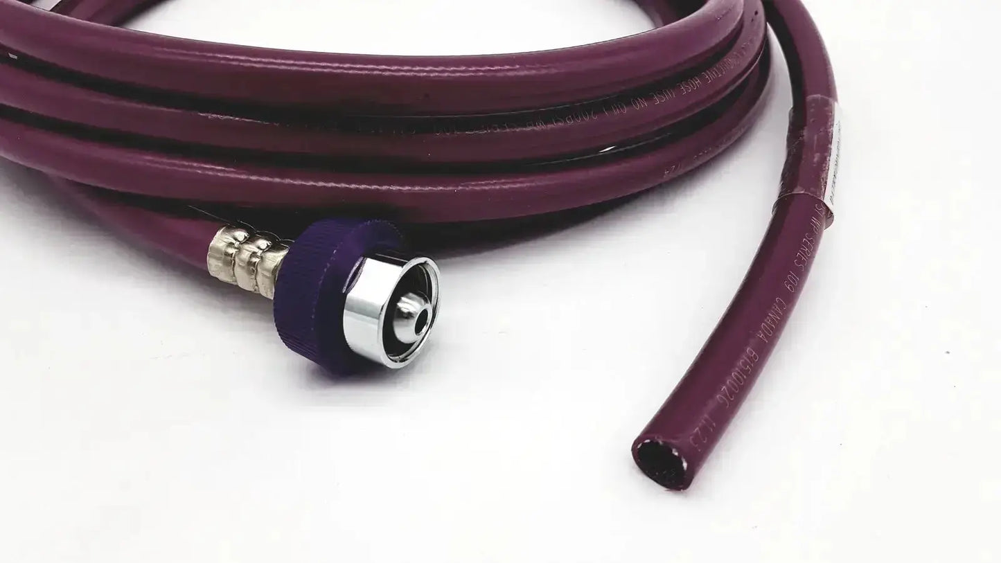 Purple coiled datex ohmeda hose assembly evacuation with metallic connector and purple rubber cap